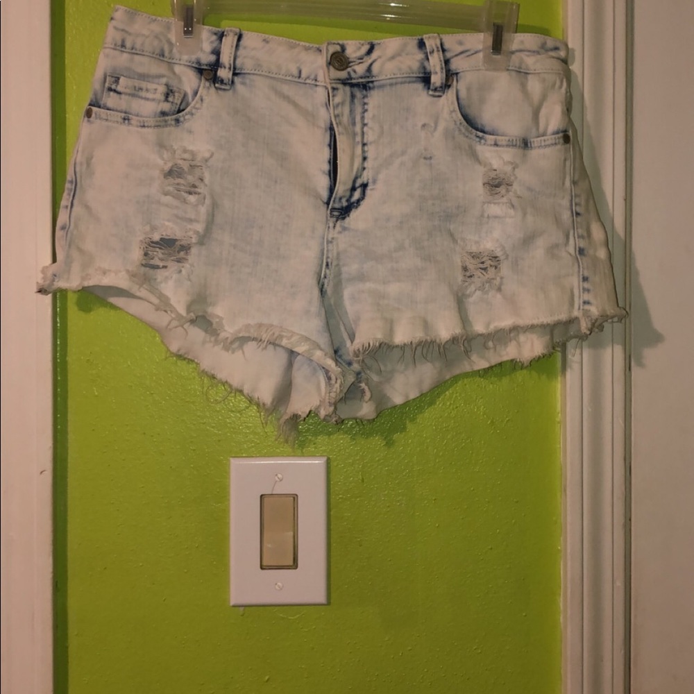 Mid-Rise, light washed distressed Denim Shorts